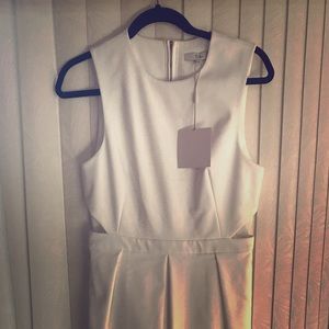 Brand new with tag, unworn.